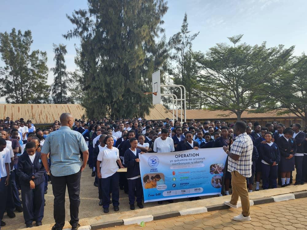 ASEDC staff and students at a child protection awareness campaign