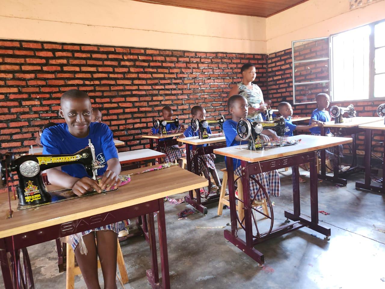 ASEDC staff leading a vocational training session